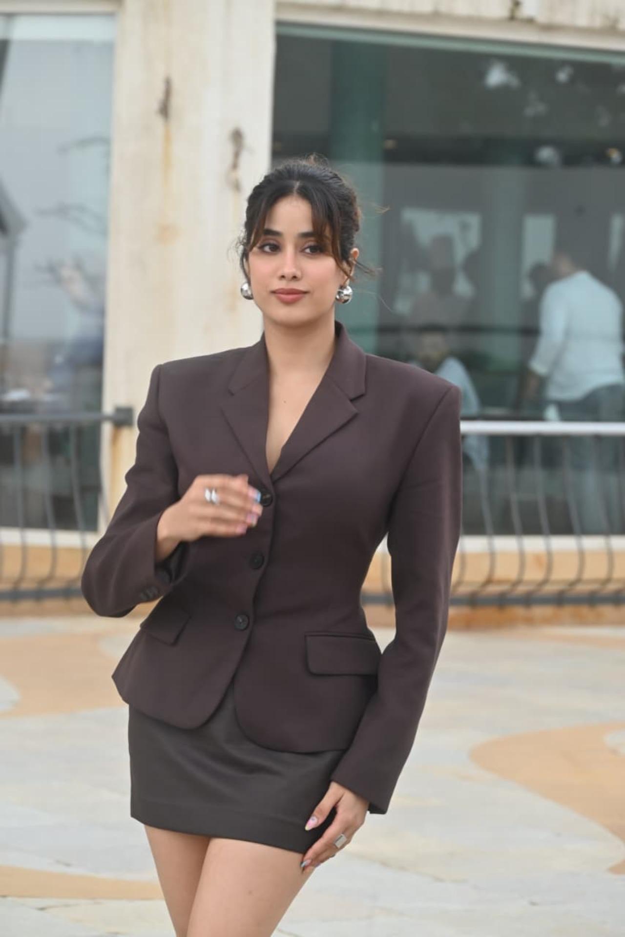 Janhvi Kapoor keeps it chic and edgy in a tailored dark brown blazer paired with a sleek black mini skirt for the interview of SSKTK.